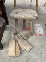 A SMALL ELM STOOL, TWO PAIRS OF BUTTER PATS AND BUTTER MOULD