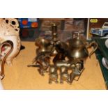 A COLLECTION OF BRASSWARE TO INCLUDE A LARGE 'WEE WILLIE WINKIE' CANDLESTICK, A TEAPOT, JUGS,