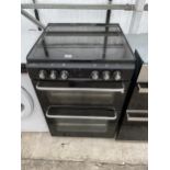 A BLACK NEW WORLD ELECTRIC OVEN AND HOB
