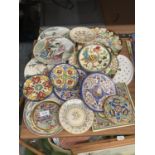 A COLLECTION OF CONTINENTAL PLATES AND SAUCERS