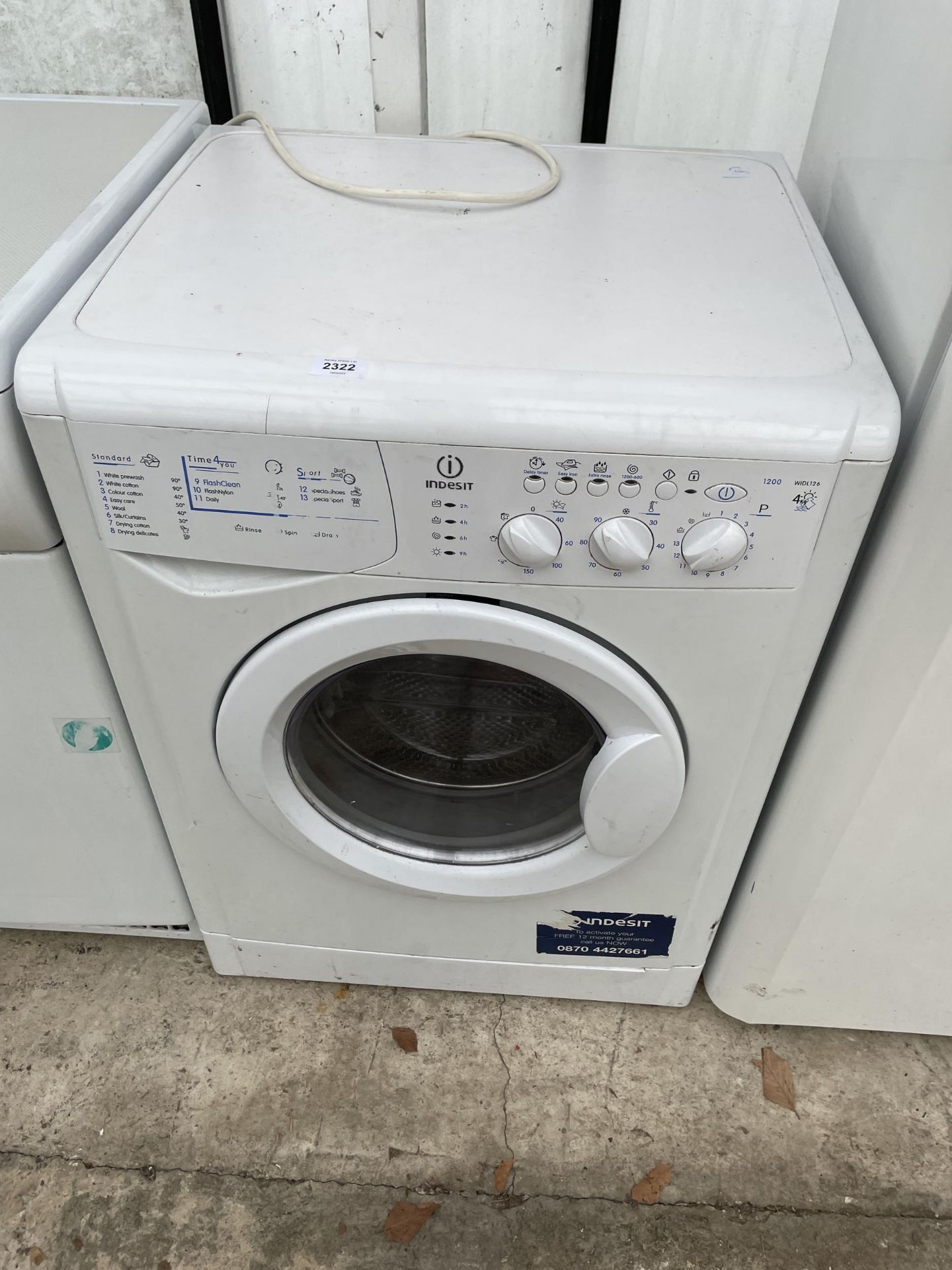 A WHITE INDESIT 4KG WASHING MACHINE