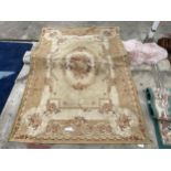 AN ORANGE LUARA ASHLEY PATTERNED RUG 5FTx8FT