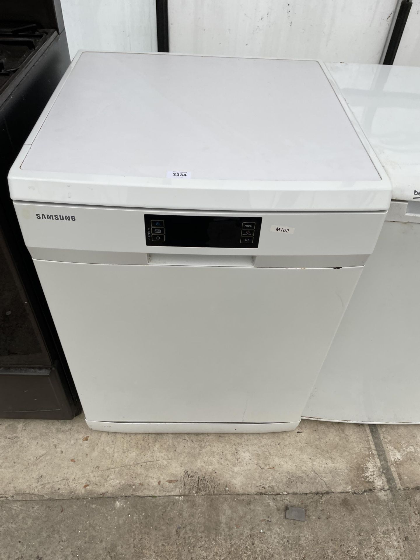 A WHITE SAMSUNG DISHWASHER