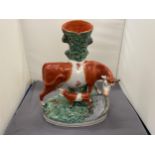 A VINTAGE STAFFORDSHIRE FLATBACK COW AND CALF SPILL HOLDER, HEIGHT 30CM