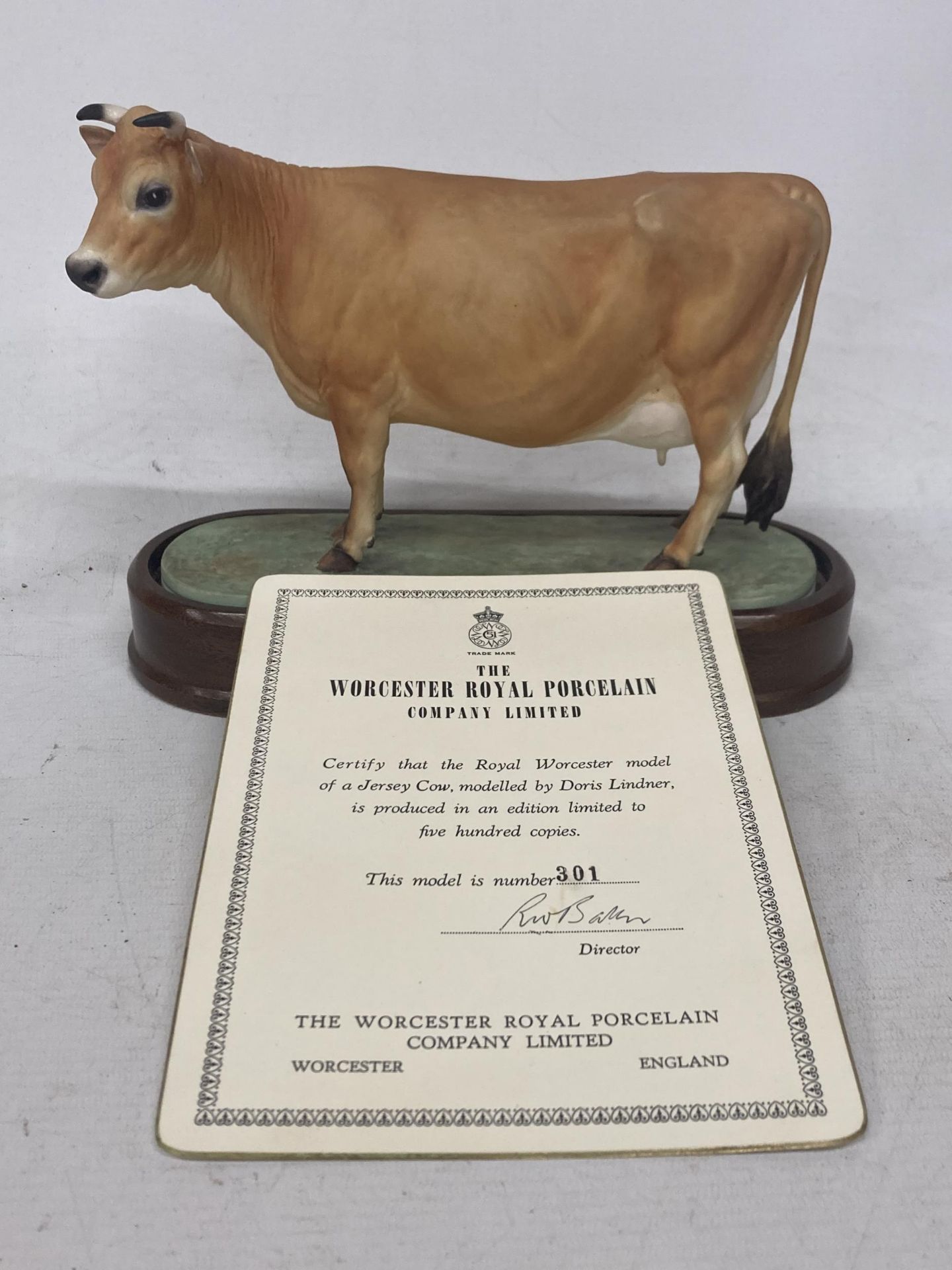 A ROYAL WORCESTER MODEL OF A JERSEY COW MODELLED BY DORIS LINDNER AND PRODUCED IN A LIMITED