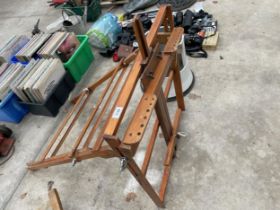 A WOODEN FOLDING ARTISTS EASEL