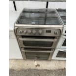 A SILVER HOTPOINT GAS OVEN AND HOB