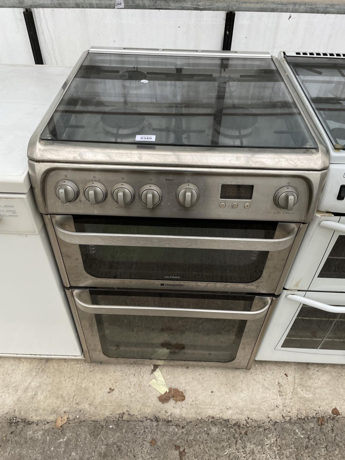 A SILVER HOTPOINT GAS OVEN AND HOB