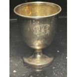 A HALLMARKED SHEFFIELD SILVER EGG CUP