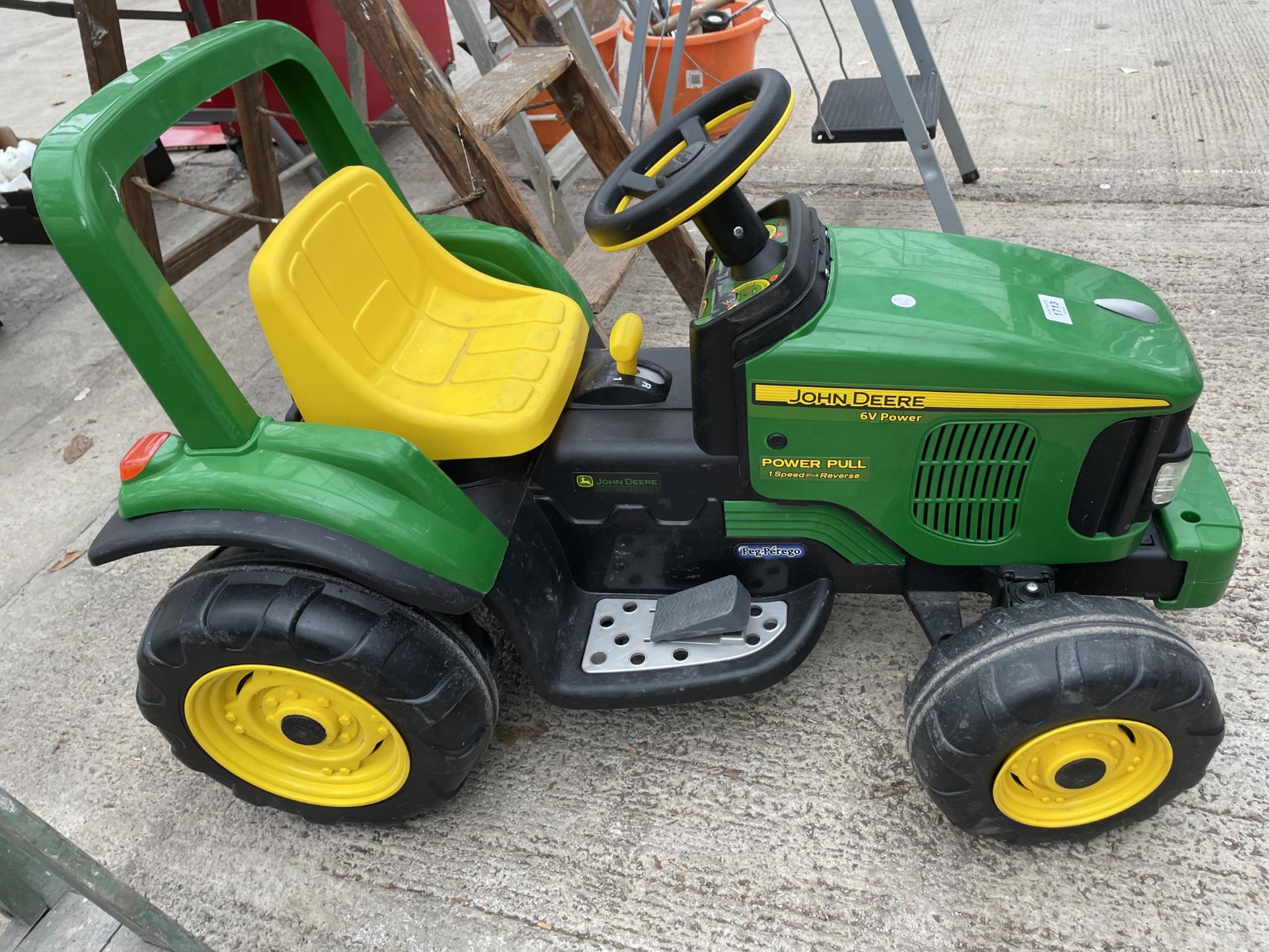 A JOHN DEERE POWER PULL RIDE ALONG ELECTRIC CHILDS TRACTOR