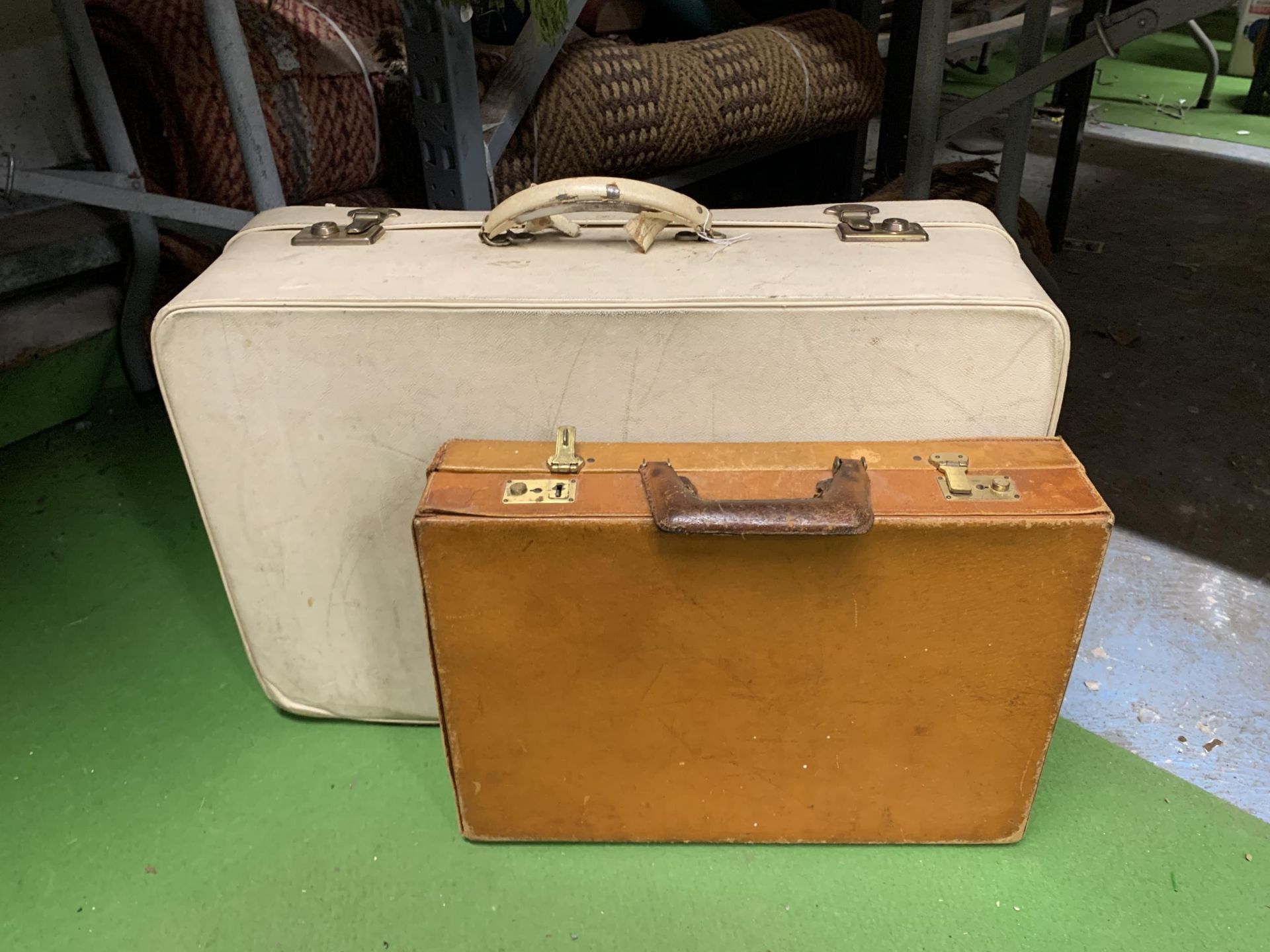 TWO VINTAGE LEATHER CASES