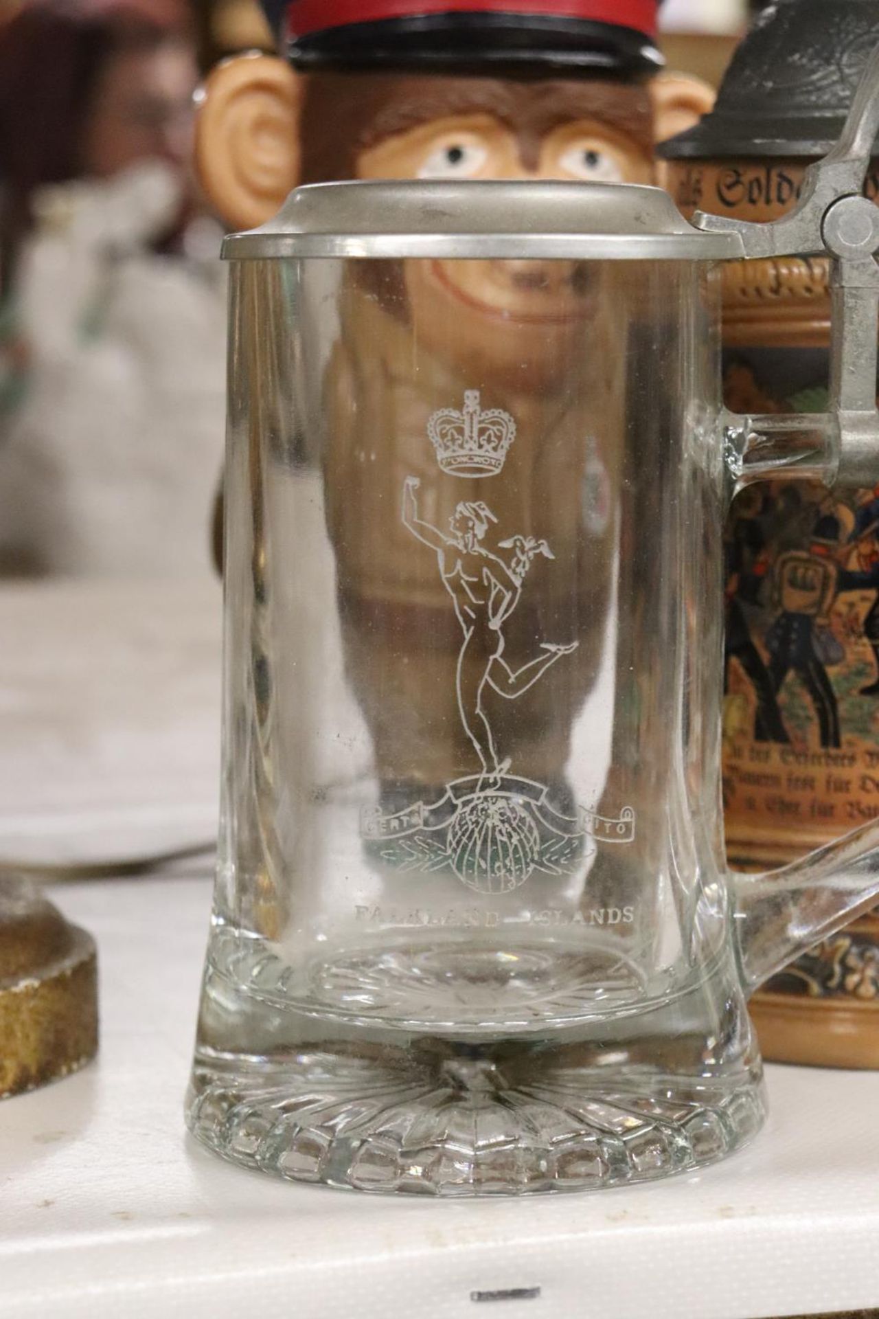 A GLASS STEIN WITH PEWTER LID ENGRAVED WITH THE FALKLAND ISLANDS, VINTAGE CERAMIC STEIN AND ' - Image 2 of 4