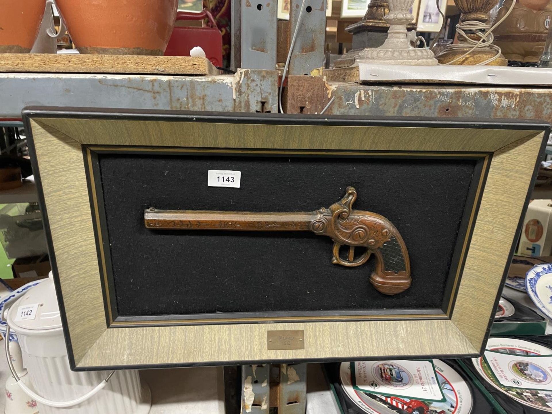 A FRAMED 'PAULEY 1812' MODEL OF A GUN