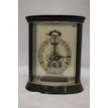 A DAVID PETERSON STYLE OVAL GLASS AND MAHOGANY SKELETON CLOCK WITH PASSING STRIKE MOVEMENT HEIGHT