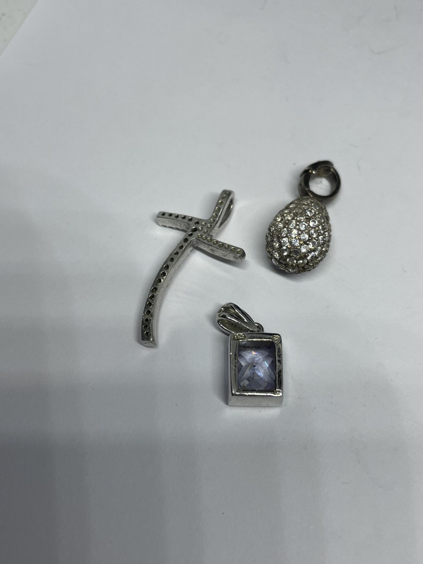 SIX MARKED 925 PENDANTS TO INCLUYDE A PINEAPPLE AND A CRUCIFIX - Image 2 of 3