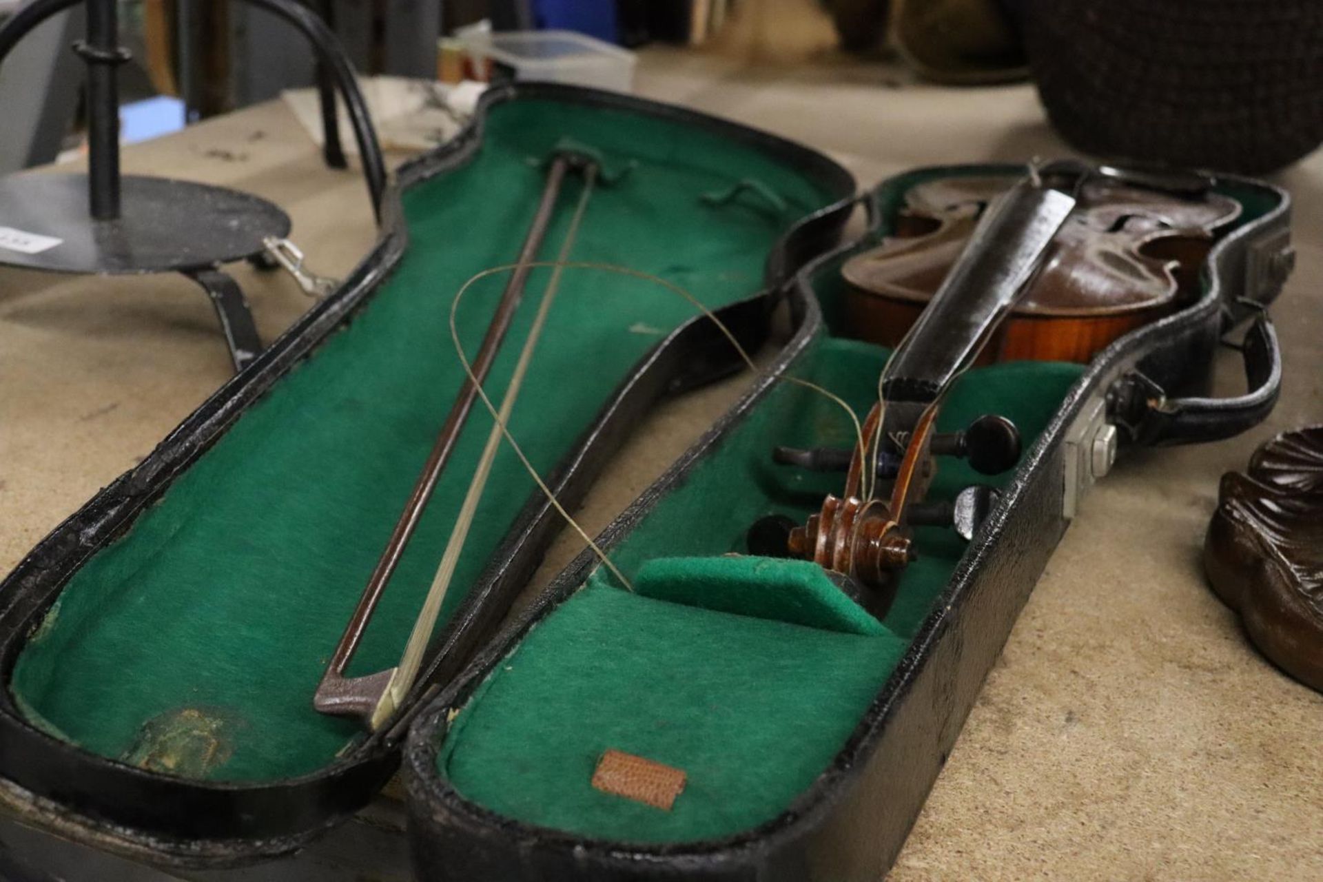 A VINTAGE VIOLIN AND BOW IN A HARD CASE