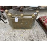 A VINTAGE AND DECORATIVE BRASS FIRE FRONT