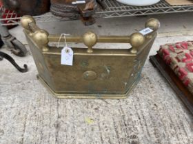 A VINTAGE AND DECORATIVE BRASS FIRE FRONT