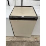 A CREAM AND BROWN HOTPOINT UNDERCOUNTER FREEZER