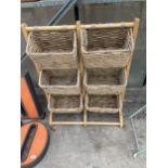 A SIX SECTION WOODEN AND WICKER STORAGE RACK