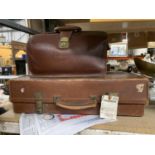 A VINTAGE LEATHER SUITCASE WITH A CANADIAN PACIFIC RAILWAY LABEL PLUS A VINTAGE LEATHER BRIEFCASE