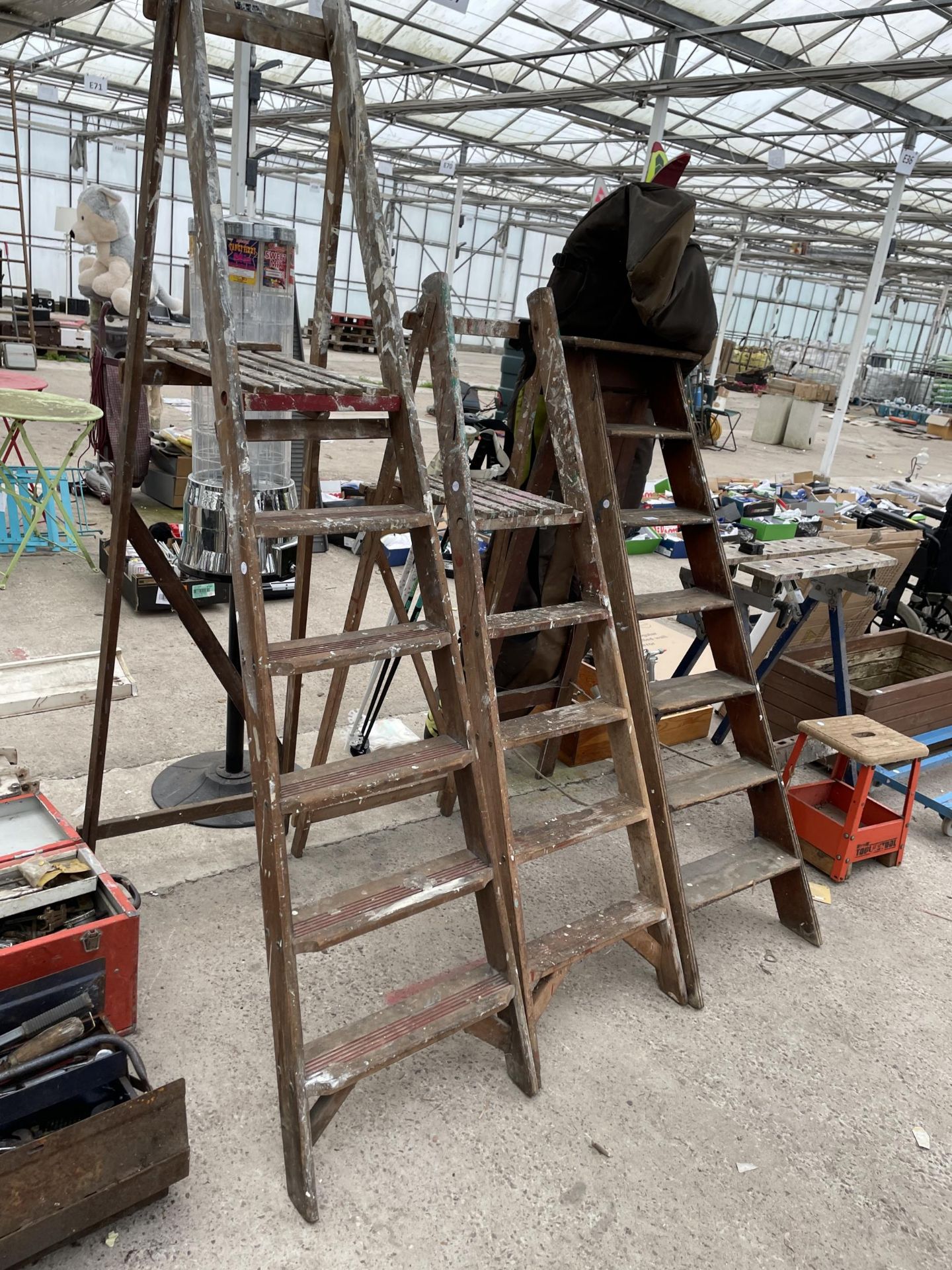 THREE VARIOUS SETS OF VINTAGE WOODEN STEP LADDERS