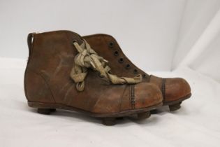 A PAIR OF VINTAGE FOOTBALL BOOTS