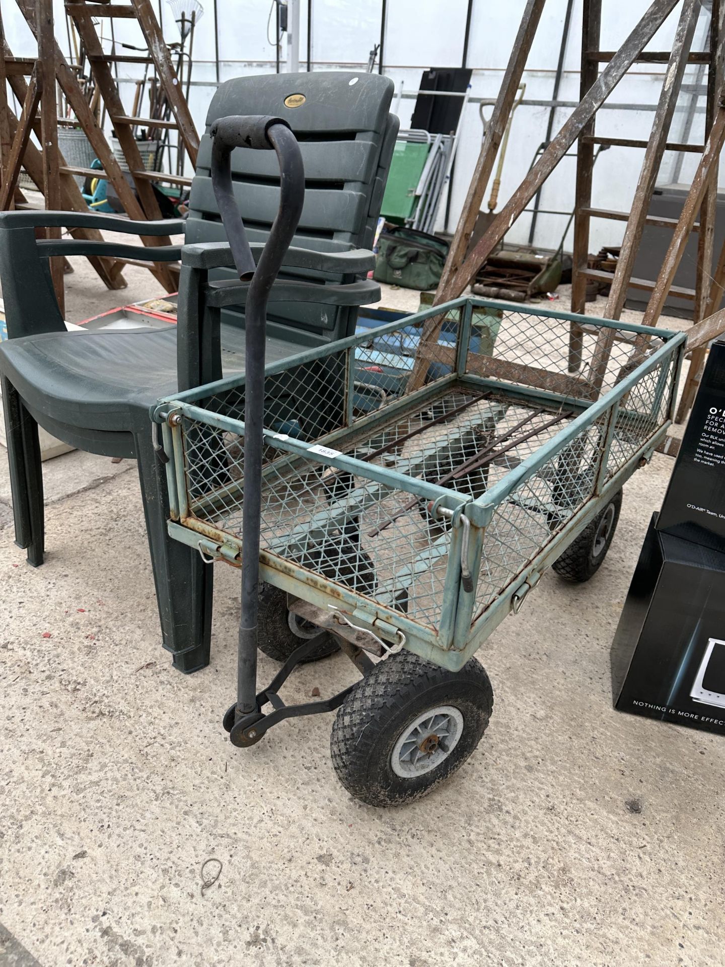 A METAL FOUR WHEELED MARKET GARDENERS TROLLEY AND TWO PLASTIC STACKING CHAIRS - Image 2 of 2