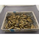 A QUANTITY OF OVER 100 BRASS BULLET CASINGS