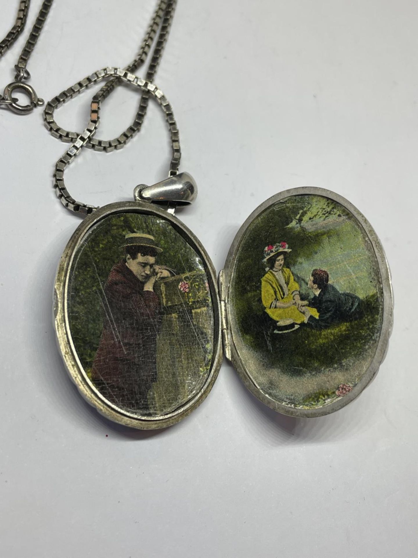 A WWI SILVER LOCKET AND CHAIN - Image 4 of 4