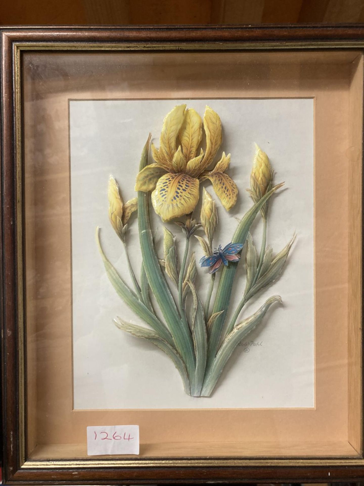 A FRAMED CERAMIC STUDY OF IRIS WITH A BUTTERFLY