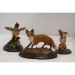 THREE MODELS OF ANIMALS ON PLINTHS TO INCLUDE ROYAL DOULTON AND COUNTRY ARTISTS