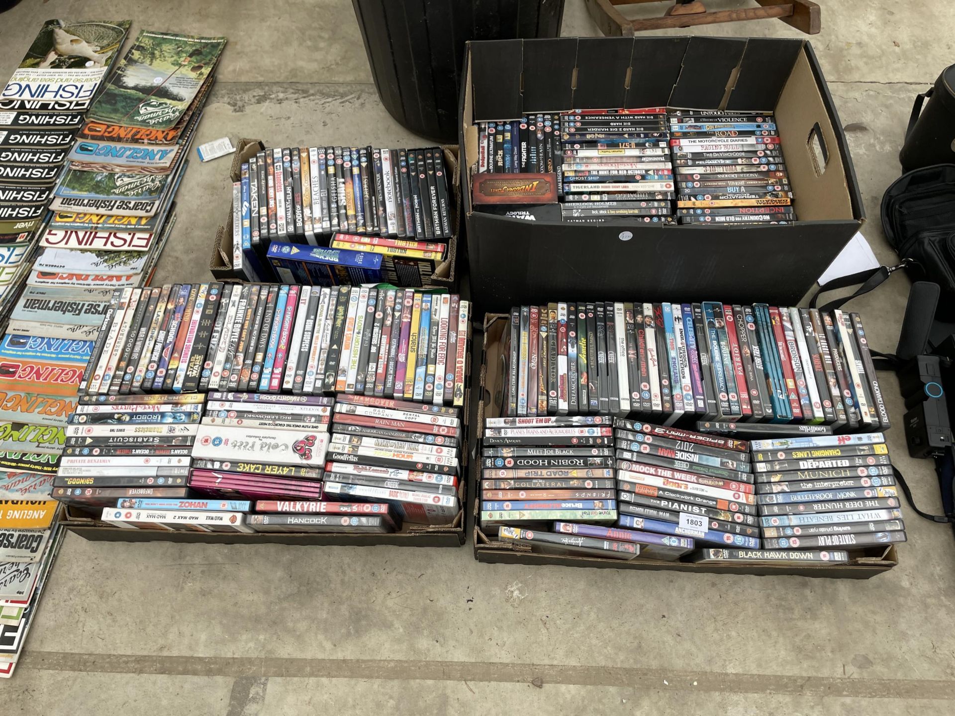 A LARGE ASSORTMENT OF DVDS