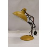 A YELLOW ANGLEPOISE LAMP