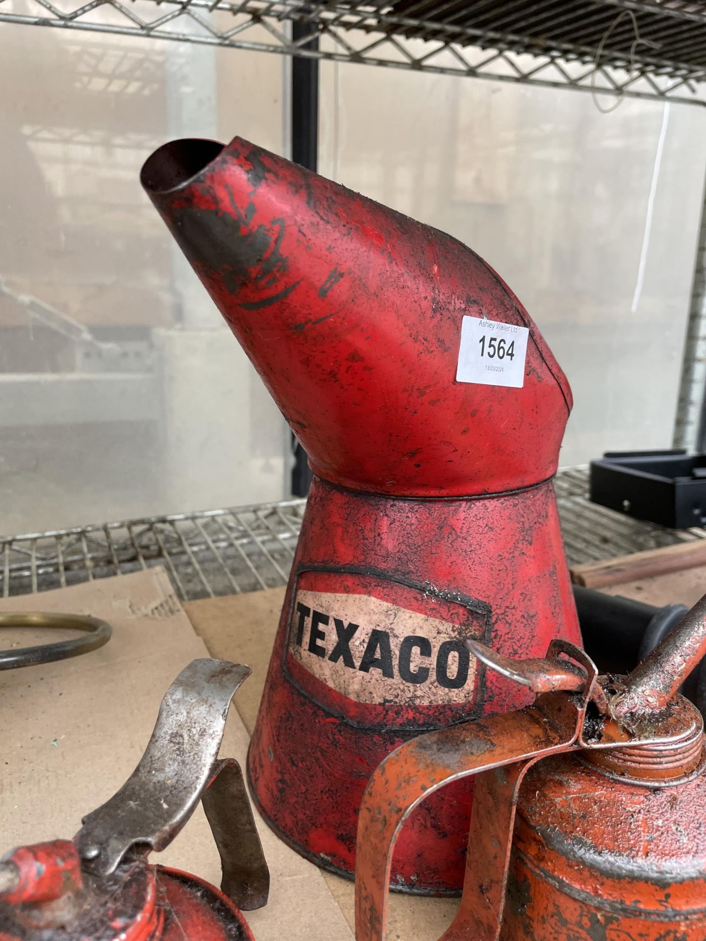 A VINTAGE TEXACO OIL JUG AND TWO PUMP ACTION OIL CANS - Image 2 of 2