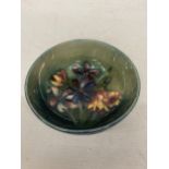 A MOORCROFT ENGLAND SPRING FLOWERS SMALL BOWL (TINY NIBBLE TO THE RIM)