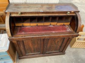 A VICTORIAN ROSEWOOD CYLINDER BUREAU WITH FITTED INTERIOR, INSET LEATHER PULL-OUT AND PIERCED