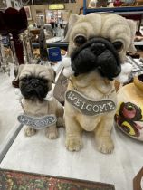 A MUMMY PUG AND PUPPY, 'WELCOME HOME' FIGURES, HEIGHTS 29CM AND 20CM