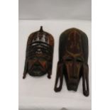 TWO AFRICAN 'TRIBAL STYLE', CARVED WOODEN WALL MASKS
