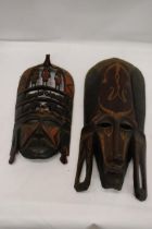 TWO AFRICAN 'TRIBAL STYLE', CARVED WOODEN WALL MASKS
