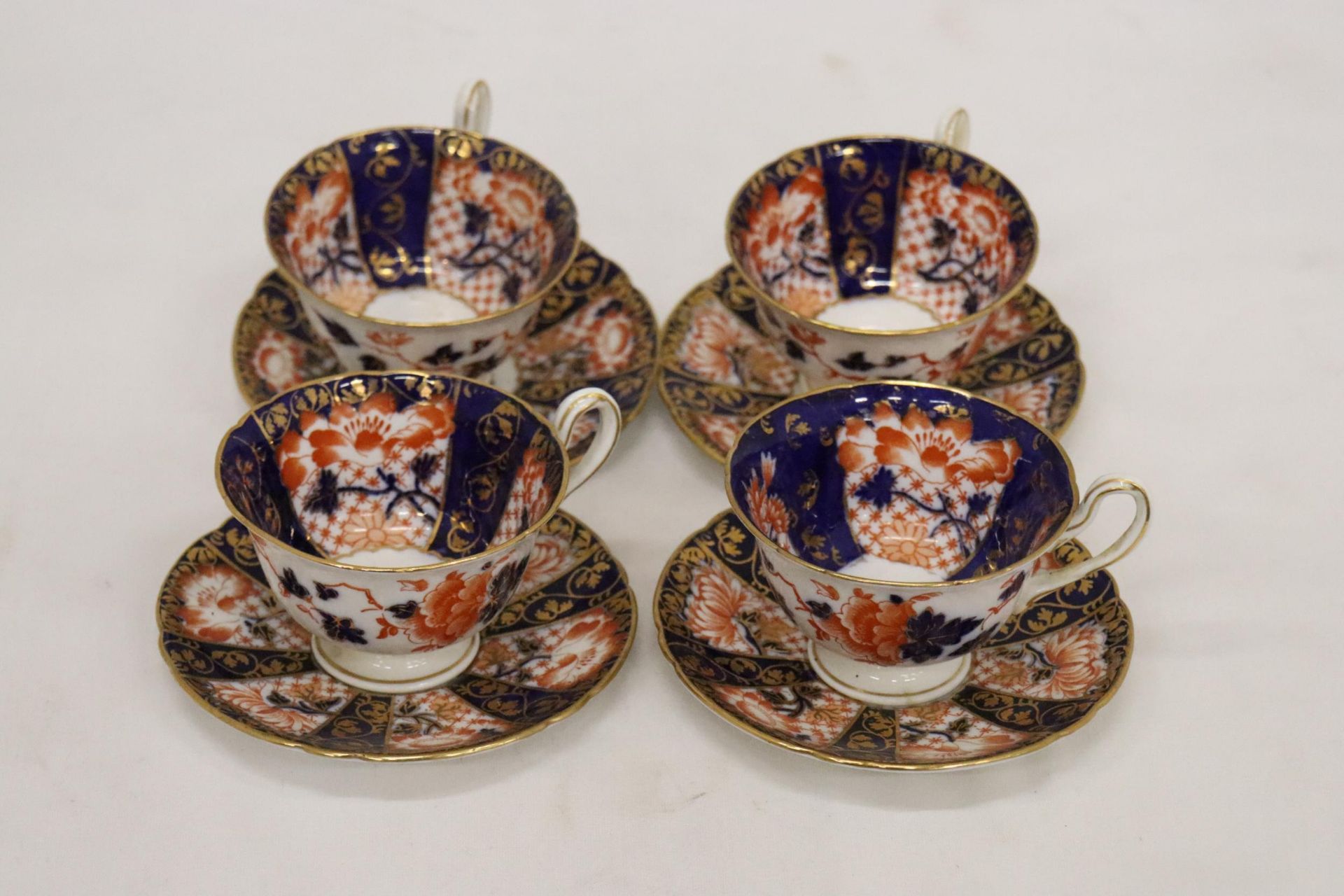 FOUR VINTAGE SHELLEY CUPS AND SAUCERS