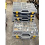 SEVEN PLASTIC HARDWARE STORAGE BOXES WITH A LARGE ASSORTMENT OF HARDWARE TO INCLUDE PIPE FITTINGS