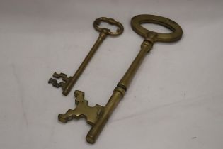 TWO LARGE HEAVY WEIGHT VINTAGE BRASS KEYS - ONE 13 INCHES LONG