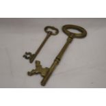 TWO LARGE HEAVY WEIGHT VINTAGE BRASS KEYS - ONE 13 INCHES LONG