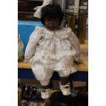 A GOTZ CARLOS 90/133 LARENE DRIBBLE BABY DOLL BY CARIN LOSSNITIZER MADE OF VINYL AND CLOTH