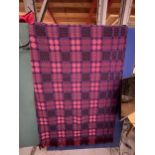 A PURPLE LIQUORICE AND PINK PURE WOOL WELSH FRINGED TAPESTRY BLANKET 246CM X 200CM