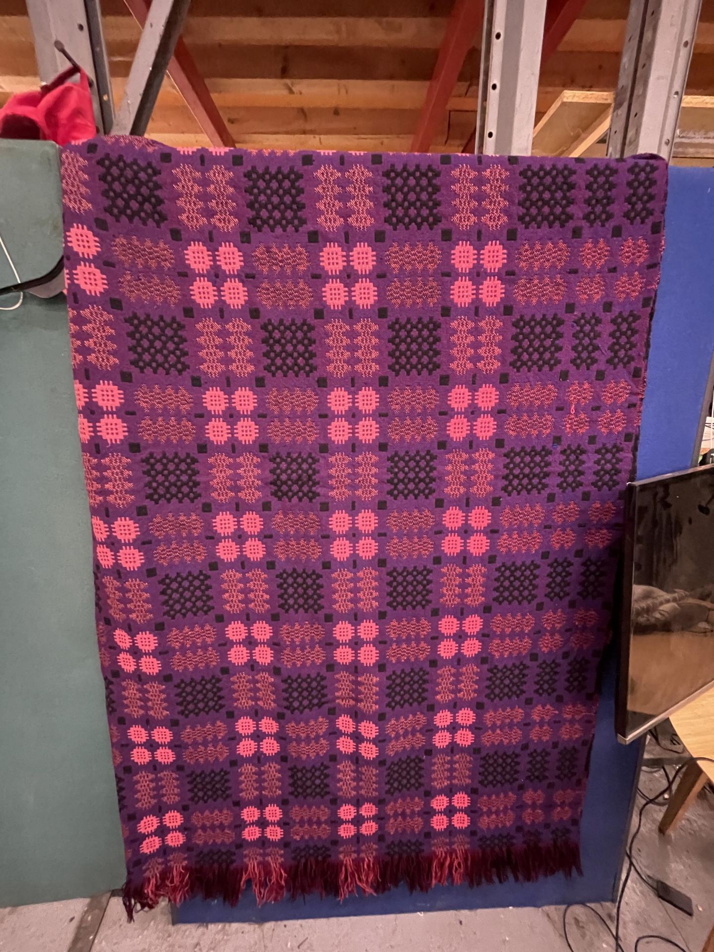 A PURPLE LIQUORICE AND PINK PURE WOOL WELSH FRINGED TAPESTRY BLANKET 246CM X 200CM