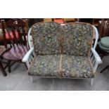 A SHABBY CHIC COTTAGE TWO SEATER SETTEE