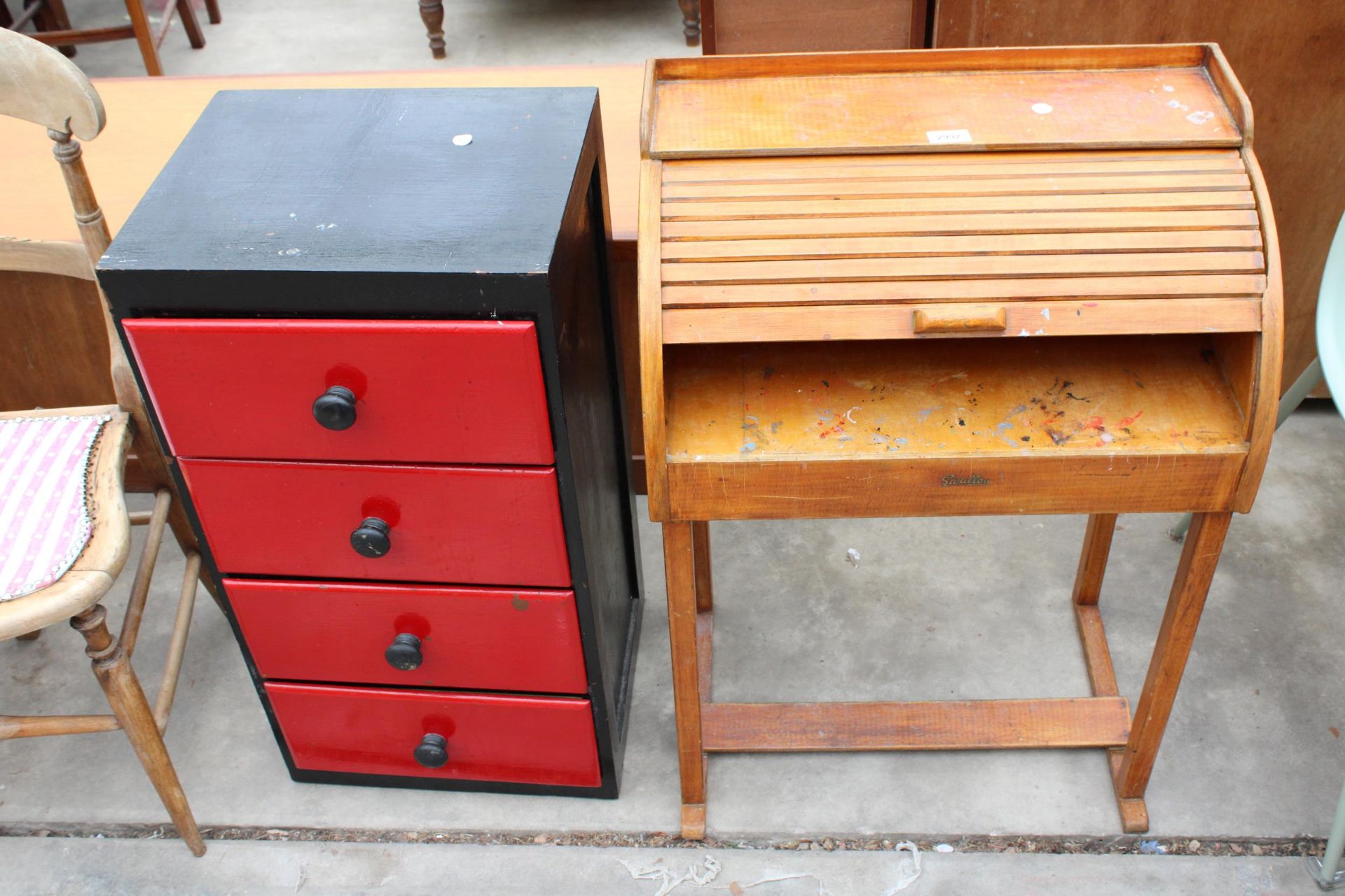 A CHILDS SWALLOW ROLL TOP DESK AND A PAINTED FOUR DRAWER CHEST