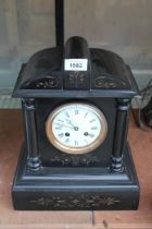 A VINTAGE HEAVY SLATE CHIMING MANTLE CLOCK